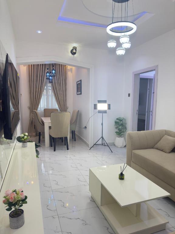 Posezení v ubytování Goldeekoin Apartment and Hotel