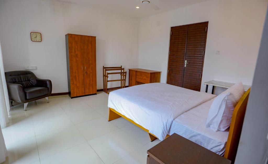 Postel nebo postele na pokoji v ubytování Liselma Residence