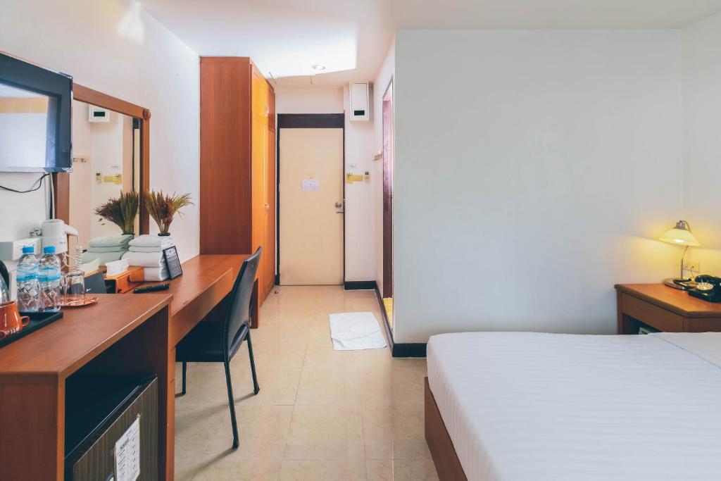 Postel nebo postele na pokoji v ubytování Atlas Bangkok Hotel
