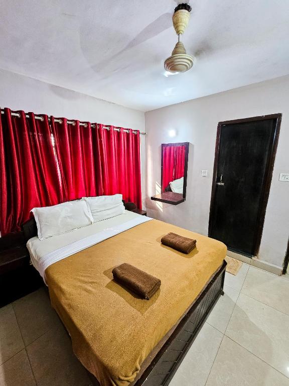 Postel nebo postele na pokoji v ubytování Rivasa Resort & Spa 5 mins to Calangute Beach