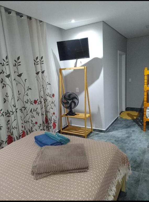 Postel nebo postele na pokoji v ubytování Pousada Lar do Sossego