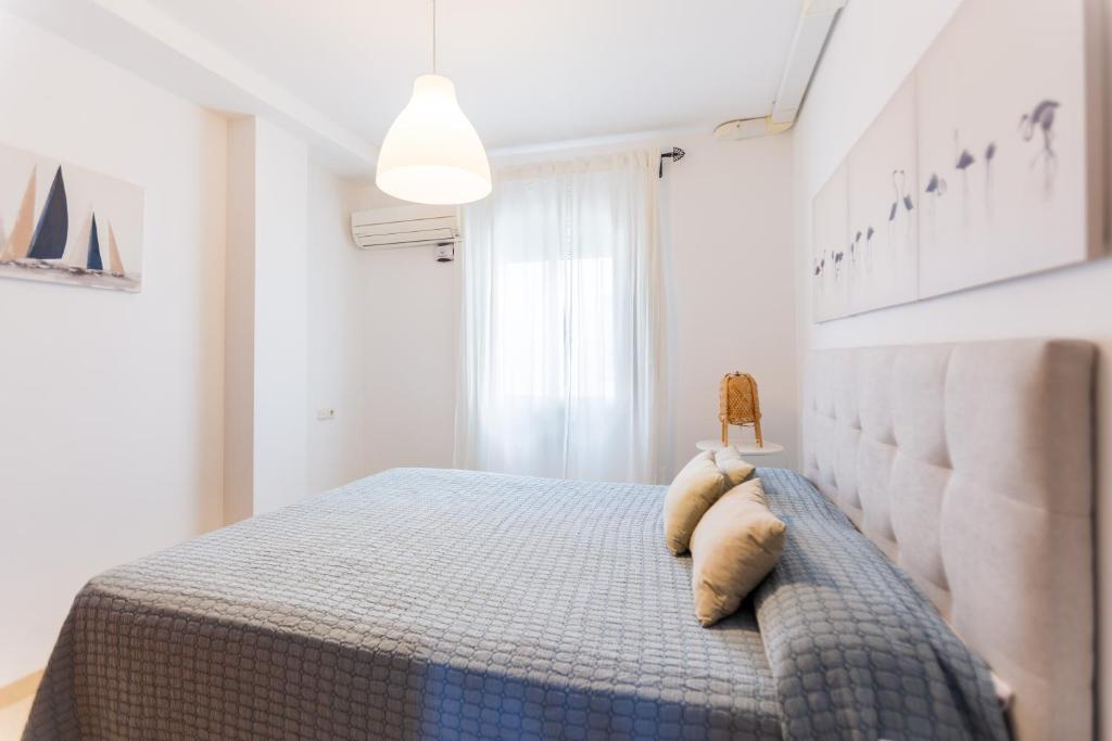 Postel nebo postele na pokoji v ubytování Bonito Apartamento en Primera Línea de Playa