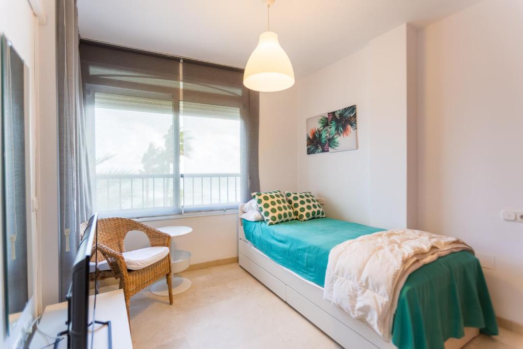 Postel nebo postele na pokoji v ubytování Bonito Apartamento en Primera Línea de Playa