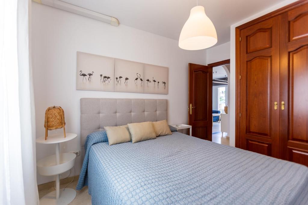 Postel nebo postele na pokoji v ubytování Bonito Apartamento en Primera Línea de Playa