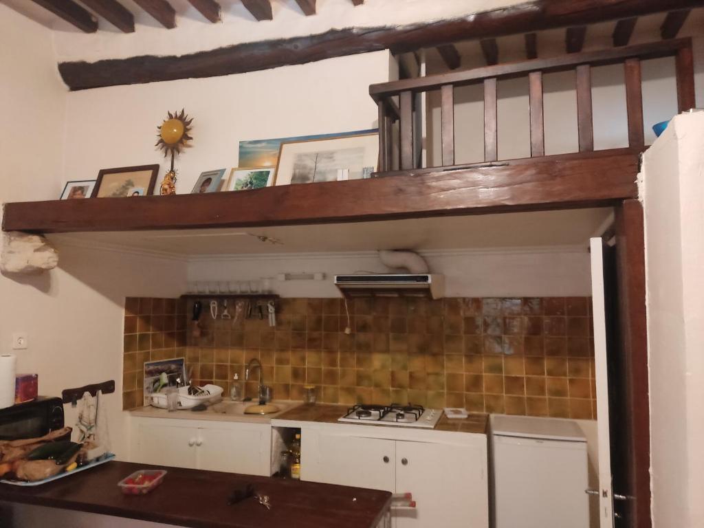 Kuchyň nebo kuchyňský kout v ubytování Studio centre ancien