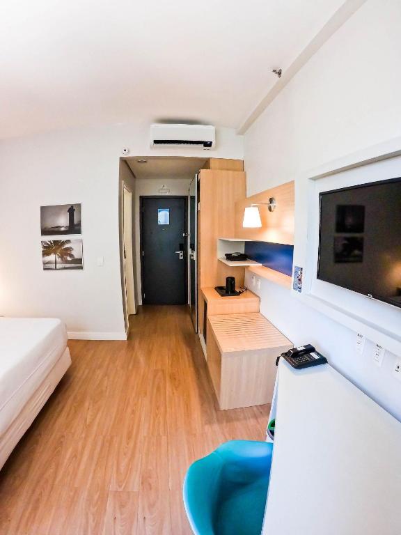 Kuchyň nebo kuchyňský kout v ubytování Stay Inn Santos Sua acomodação com cara de Hotel