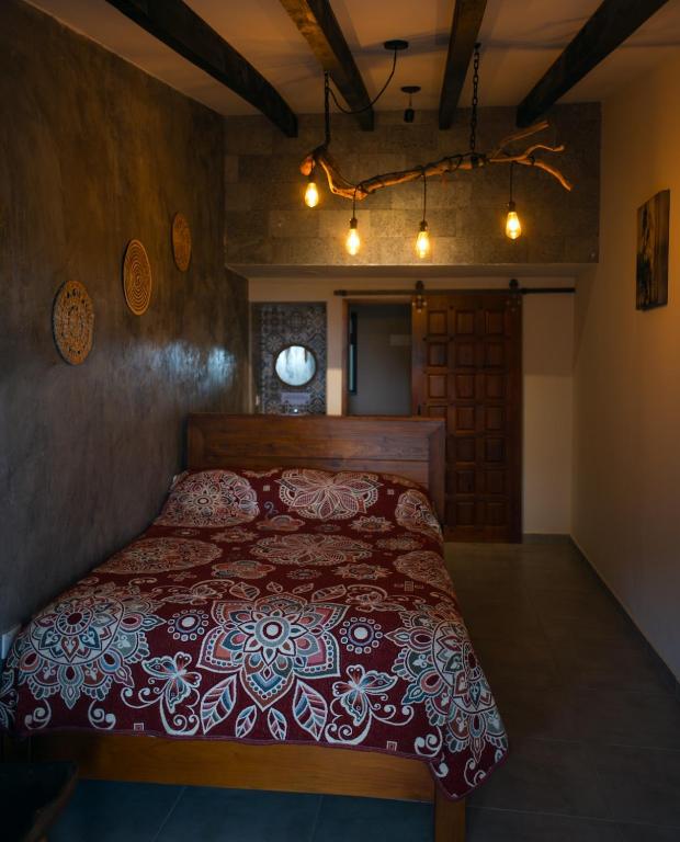 Postel nebo postele na pokoji v ubytování Casa Real Araiso