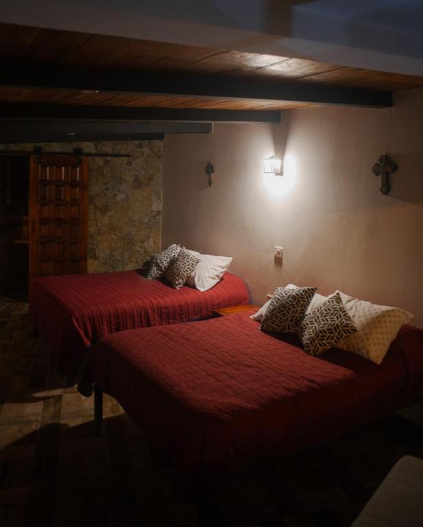 Postel nebo postele na pokoji v ubytování Casa Real Araiso