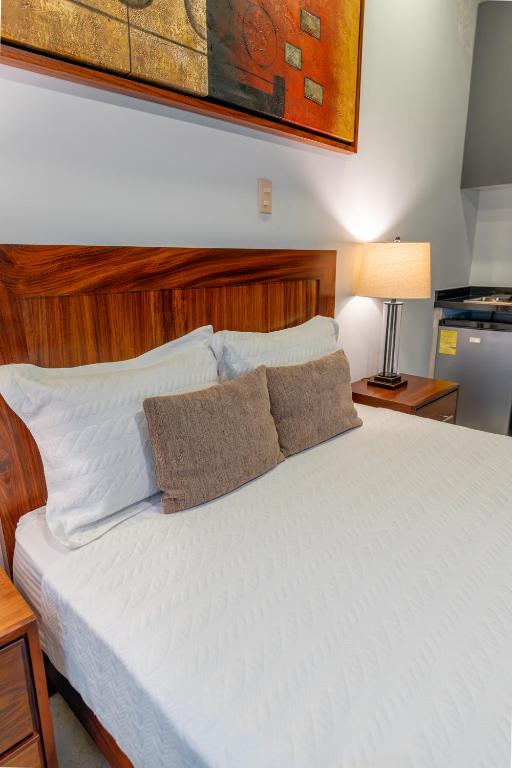 Postel nebo postele na pokoji v ubytování Hotel NG