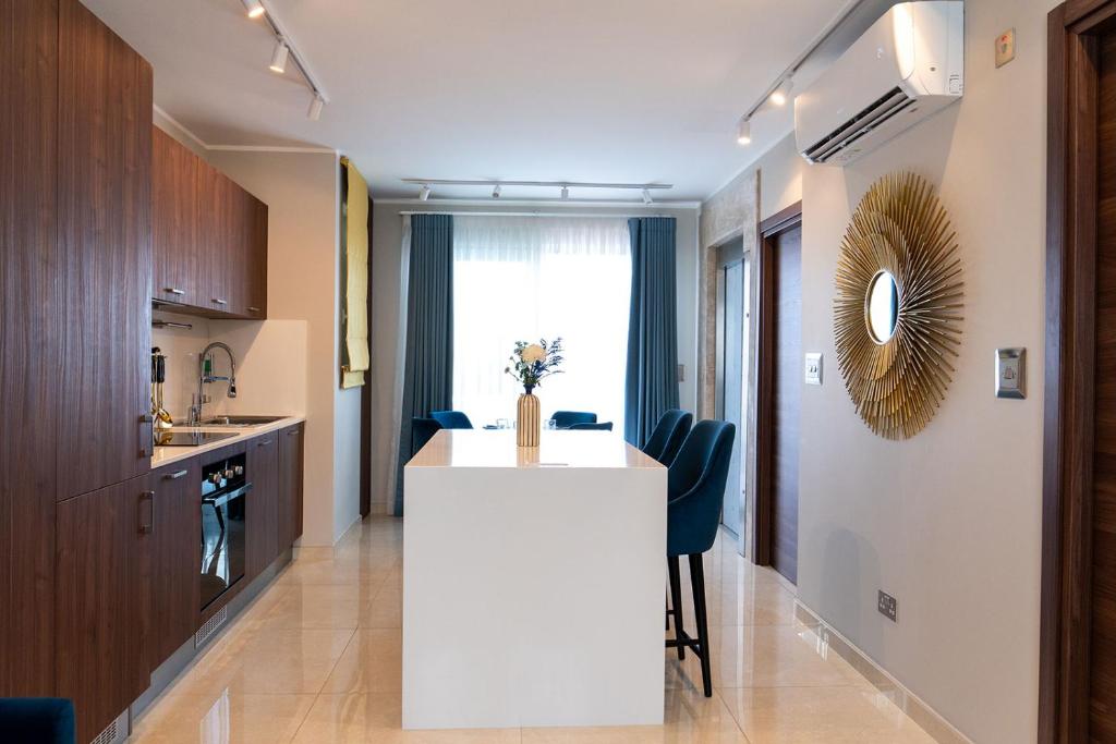 Kuchyň nebo kuchyňský kout v ubytování Domus Boutique Hotel