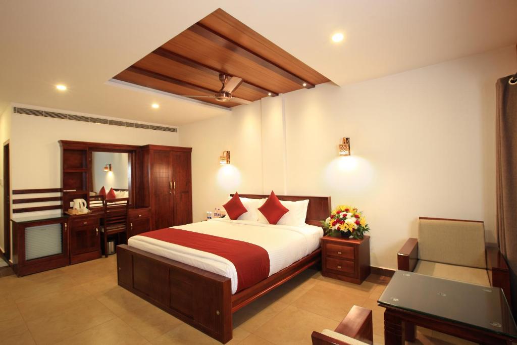 Voodi või voodid majutusasutuse Arayal Resort-A Unit of Sharoy Resort toas