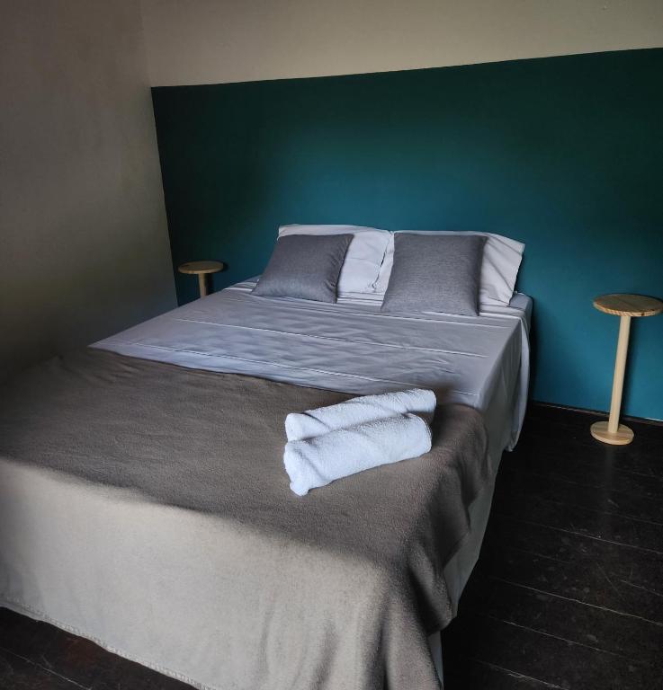 Cama ou camas em um quarto em Pousada Pitaya Maresias