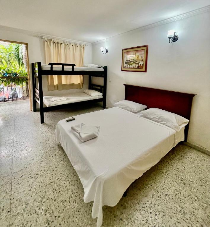 Postel nebo postele na pokoji v ubytování Hotel Casa Fátima