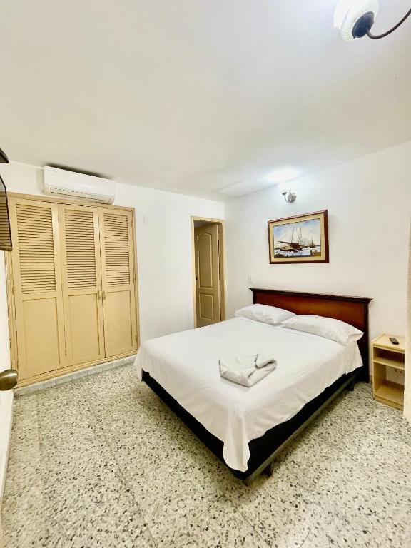 Postel nebo postele na pokoji v ubytování Hotel Casa Fátima