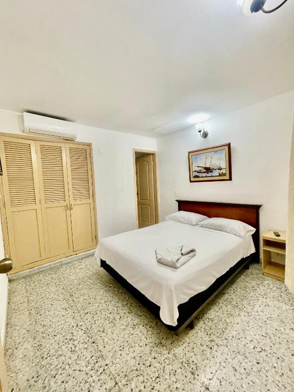 Postel nebo postele na pokoji v ubytování Hotel Casa Fátima
