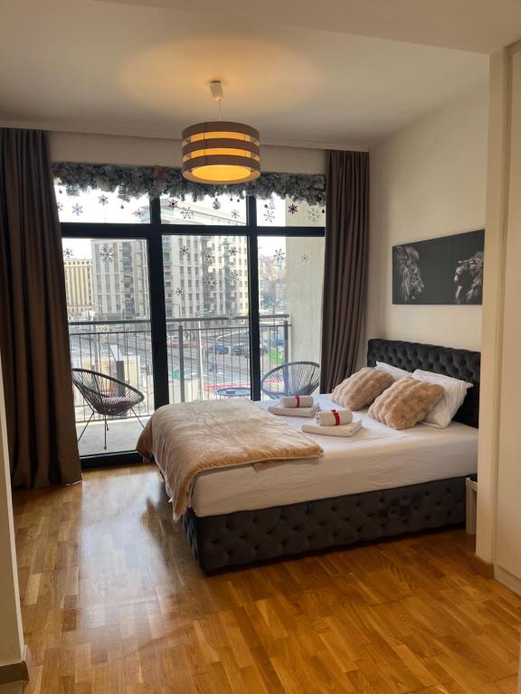 Postel nebo postele na pokoji v ubytování Angel BW Apartments