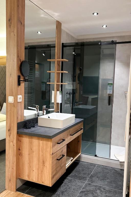 Koupelna v ubytování Hotel Sonnfeld