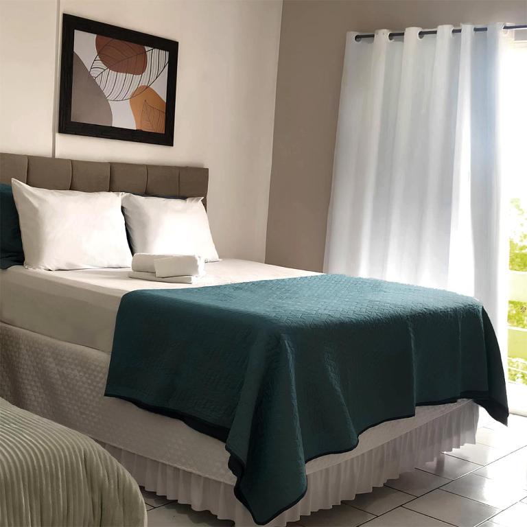 Postel nebo postele na pokoji v ubytování Simar Hotel