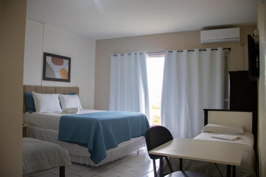 Postel nebo postele na pokoji v ubytování Simar Hotel