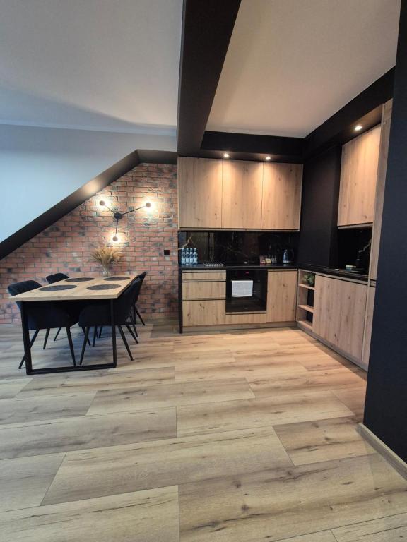 Kuchyňa alebo kuchynka v ubytovaní Asti Apartamenty Centrum Stargard