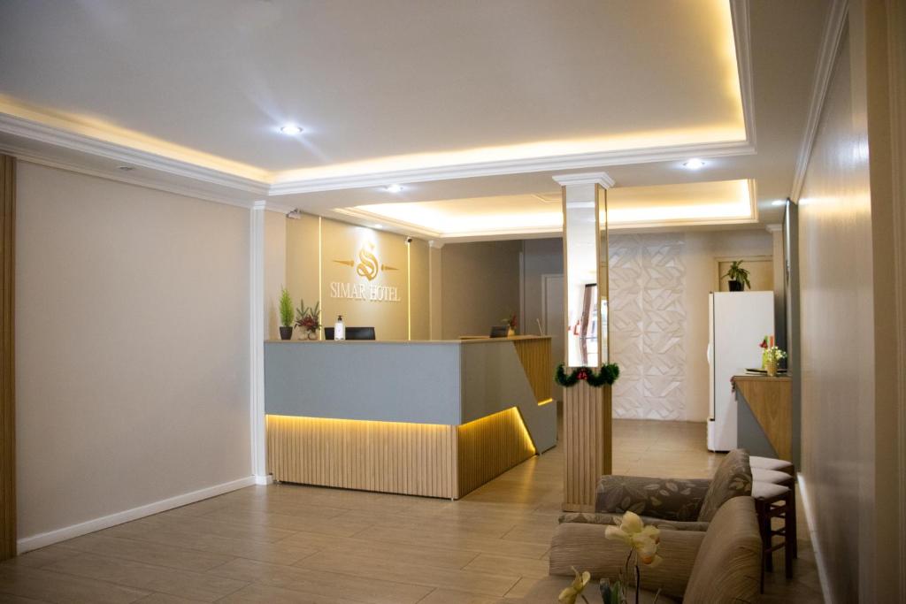 Posezení v ubytování Simar Hotel