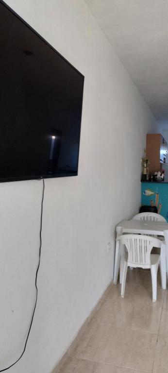 TV a/nebo společenská místnost v ubytování Meu lar