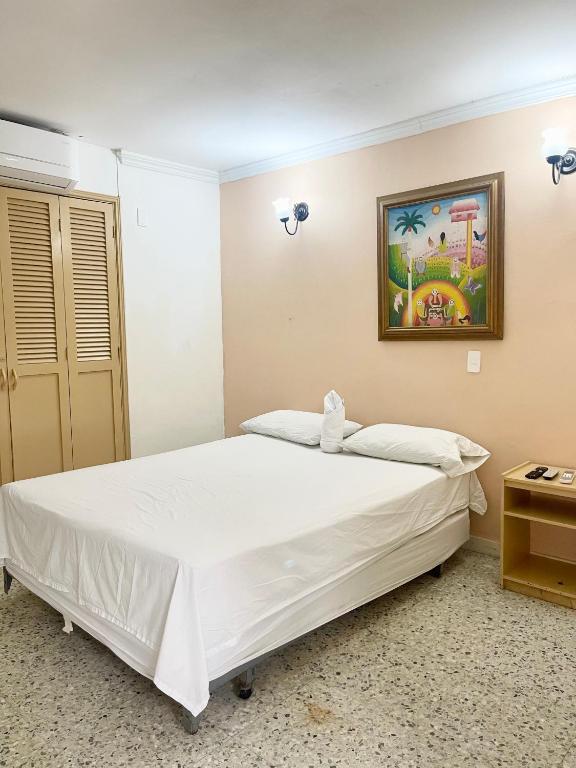 Postel nebo postele na pokoji v ubytování Hotel Casa Fátima
