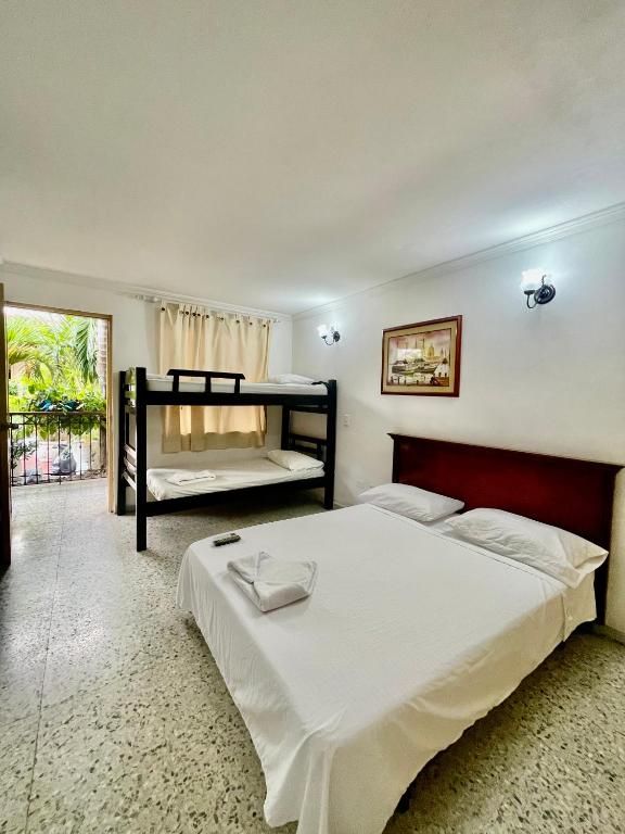 Postel nebo postele na pokoji v ubytování Hotel Casa Fátima