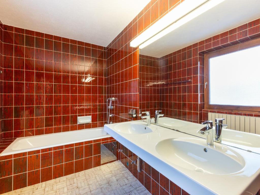 Koupelna v ubytování Holiday home Ginin Ramsau in Zillertal