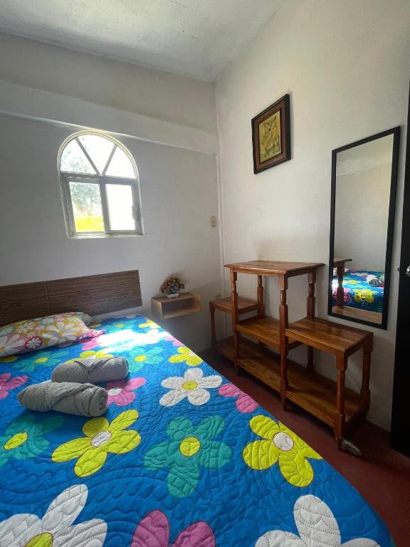 Postel nebo postele na pokoji v ubytování Villa Playa Encantada