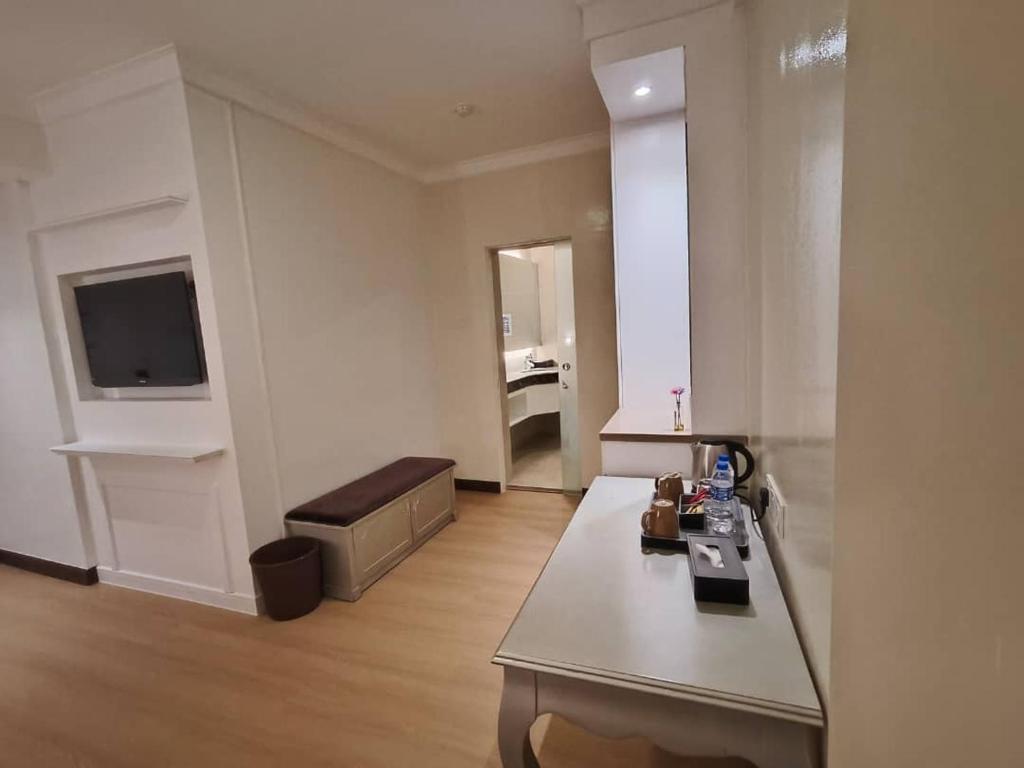 TV a/nebo společenská místnost v ubytování RC Hotel Melaka
