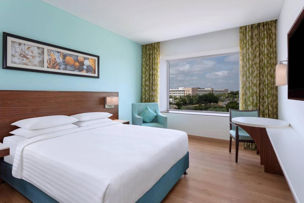 Postel nebo postele na pokoji v ubytování Fairfield by Marriott Coimbatore