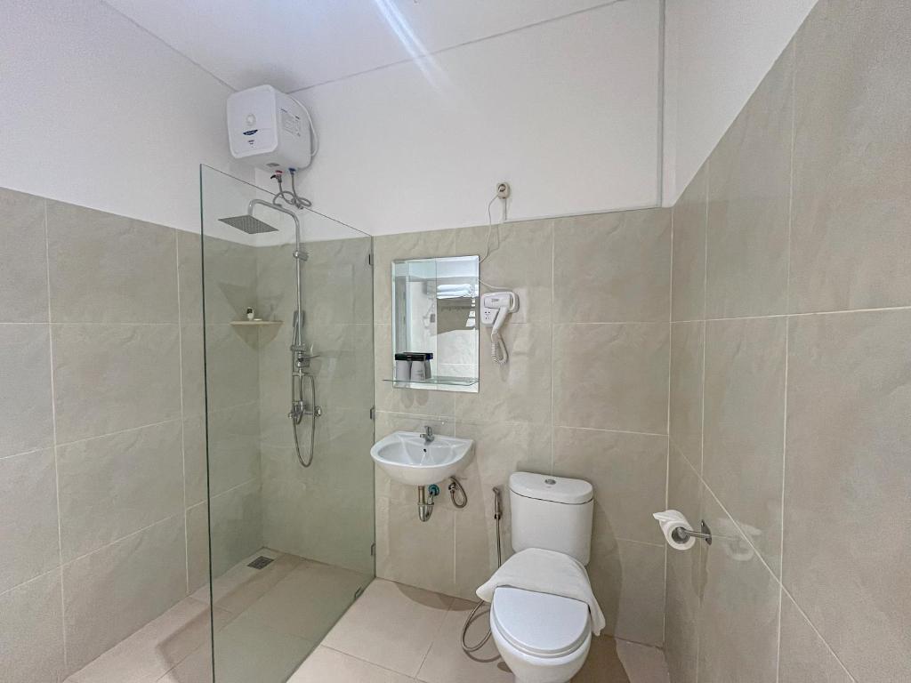 Koupelna v ubytování Graha Socio Hotel Nusa Dua Bali