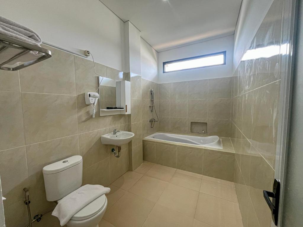 Koupelna v ubytování Graha Socio Hotel Nusa Dua Bali