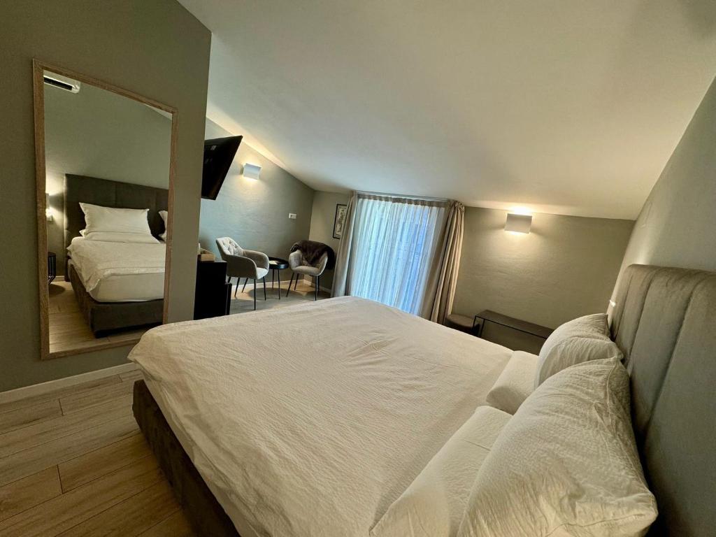 Postel nebo postele na pokoji v ubytování Villa Jasmine