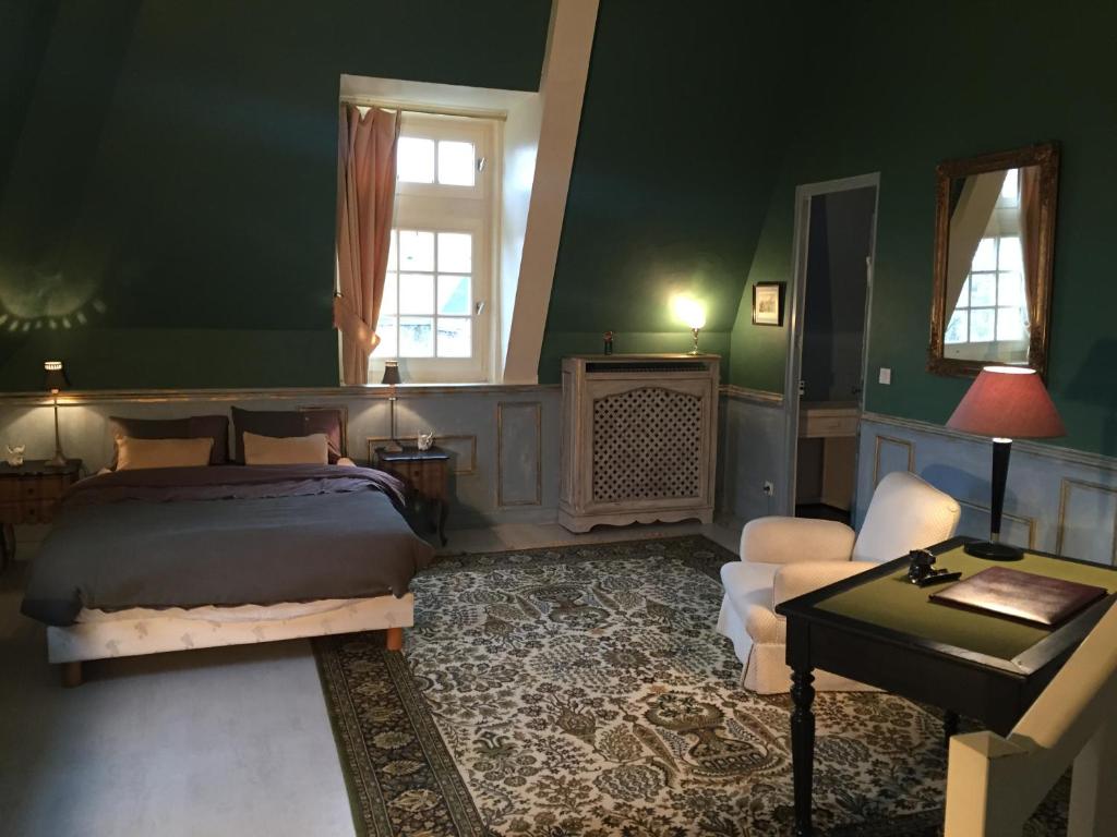 Postel nebo postele na pokoji v ubytování Le Castel Ecossais