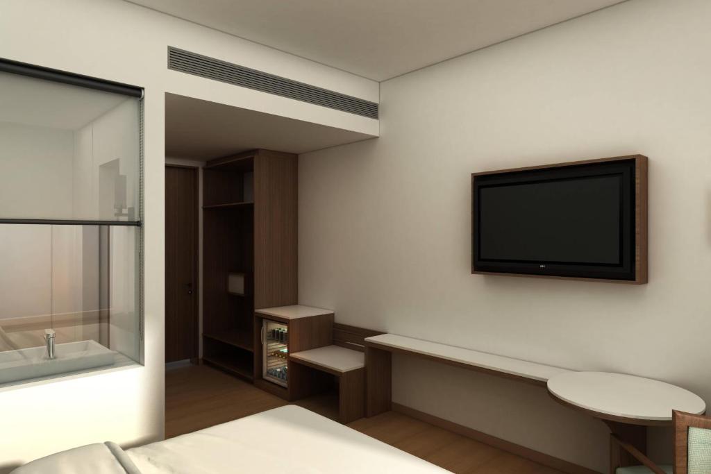 TV a/nebo společenská místnost v ubytování Fairfield by Marriott Chennai OMR