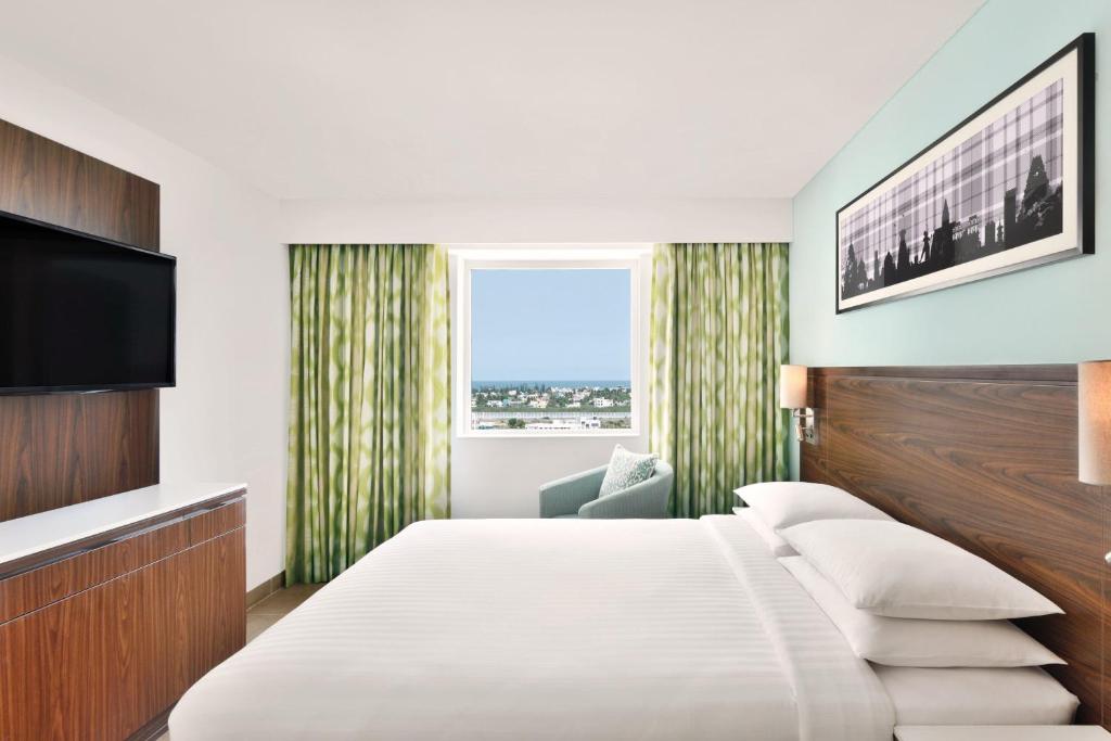 Postel nebo postele na pokoji v ubytování Fairfield by Marriott Chennai OMR