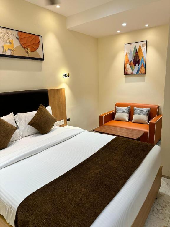 Postel nebo postele na pokoji v ubytování HOTEL TOUCHWOOD