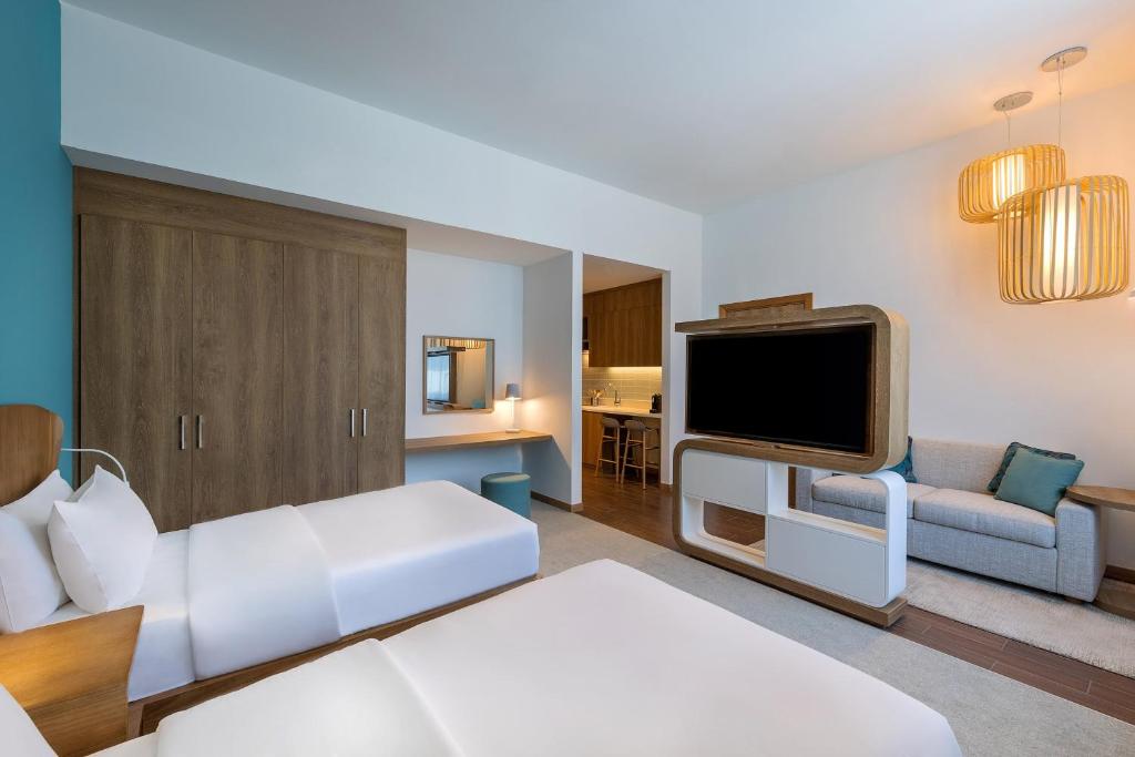 
Studio 2 Single Beds - Complimentary Transfer to Dubai Mall / Burj Khalifa, Burjuman & Kite Beach
