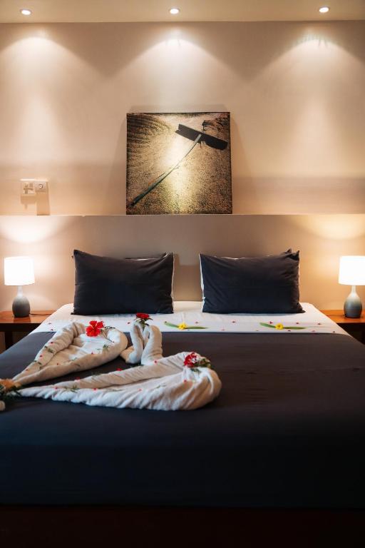 Postel nebo postele na pokoji v ubytování Battambang Resort