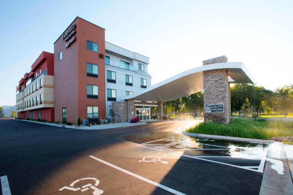 an empty parking lot in front of a building at Fairfield Inn & Suites by Marriott Detroit Lakes in Detroit Lakes