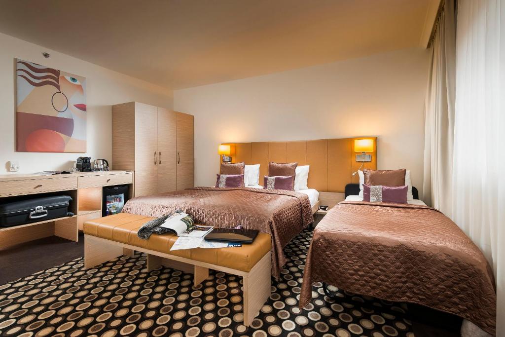 Postel nebo postele na pokoji v ubytování Bo33 Hotel Family & Suites