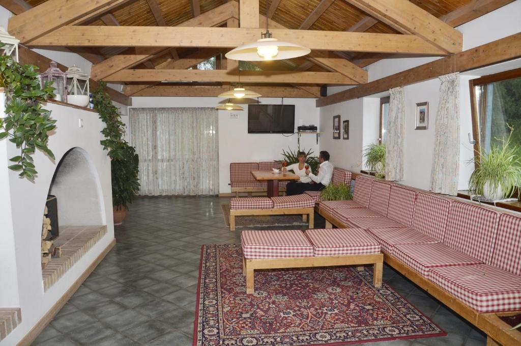 TV a/nebo společenská místnost v ubytování Hotel Martinella