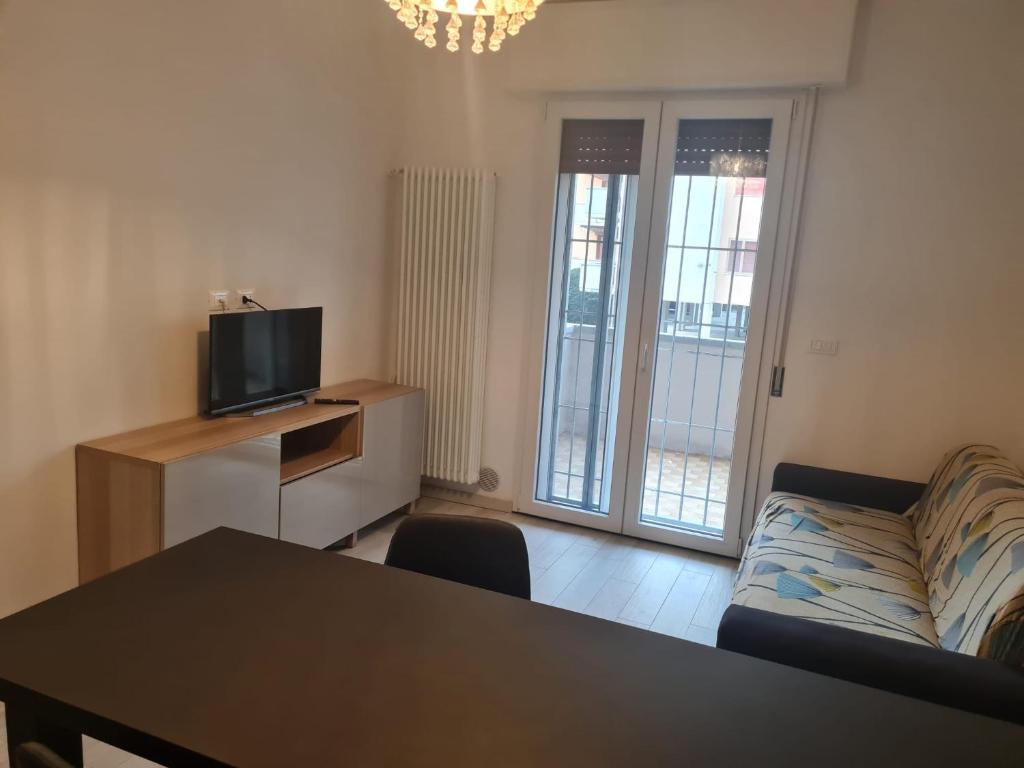 TV a/nebo společenská místnost v ubytování Residence Adriano