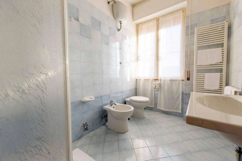 Hotel Aquila - Quarto Quádruplo