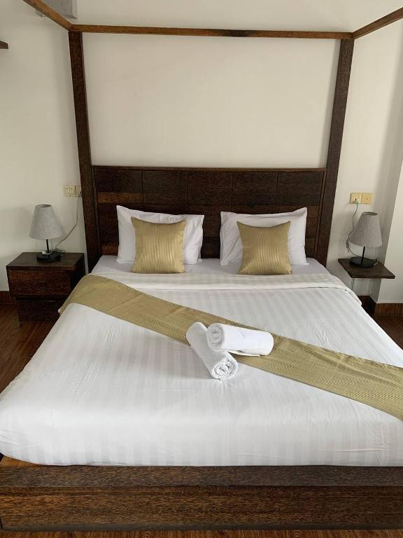 Postel nebo postele na pokoji v ubytování Suite Home Boutique Hotel
