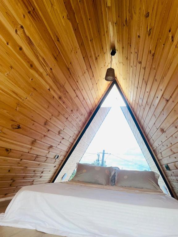 Postel nebo postele na pokoji v ubytování Demetra Cotages