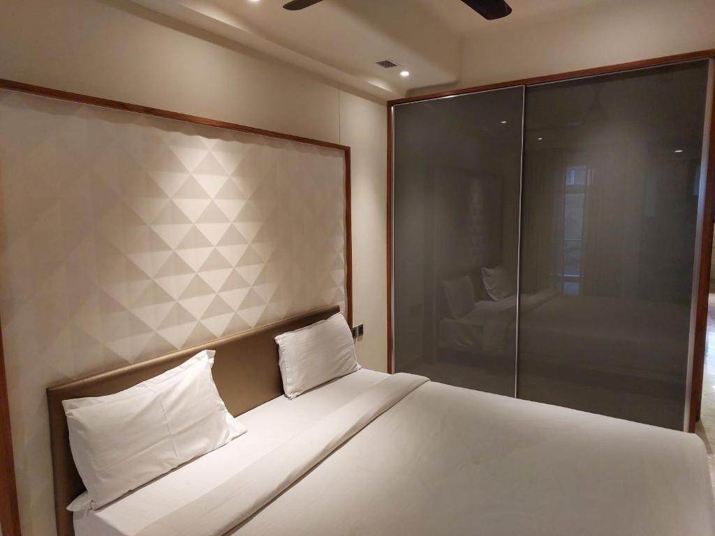Ένα ή περισσότερα κρεβάτια σε δωμάτιο στο Pallacia - Luxury Apartment