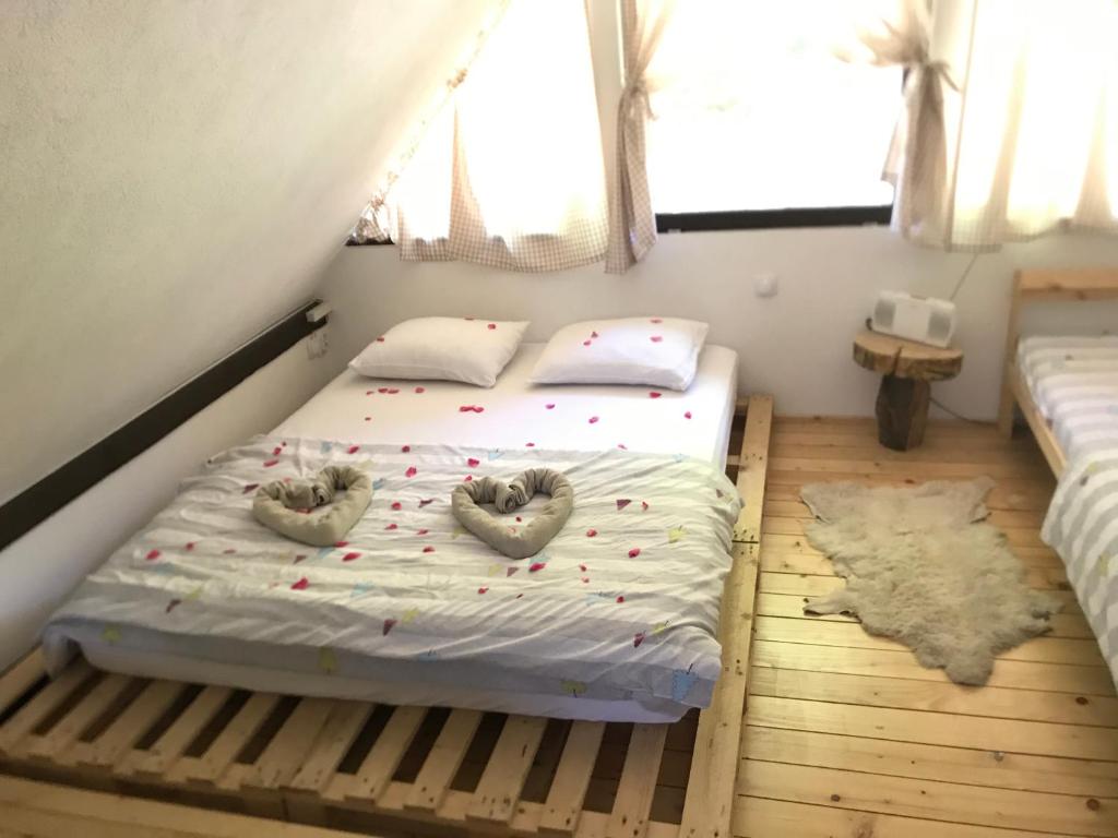 Postel nebo postele na pokoji v ubytování Vila Krnjević Jastrebac